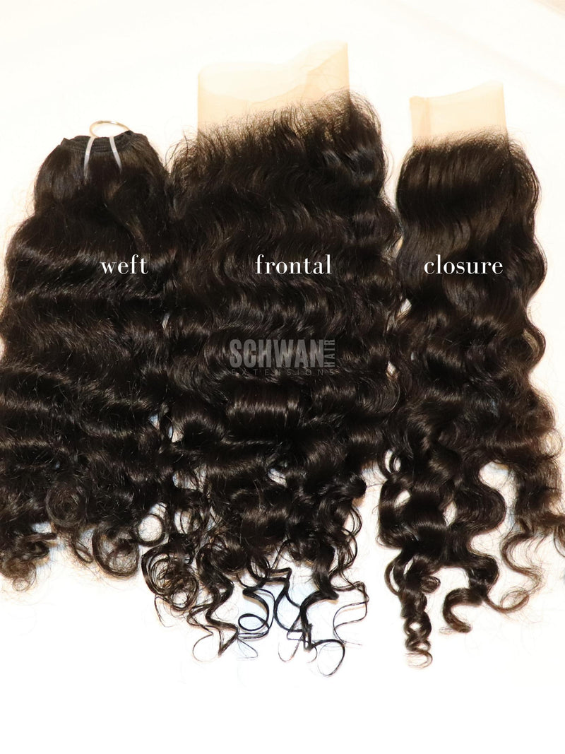 Raw Indian natural curly hair bundles showing natural variation between bundles