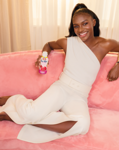 Dina asher smith wearing raw cambodian wavy bundles, half up half down, styled by zateesha barbour