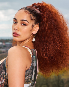 Jorja Smith wearing raw burmese curly, coloured and styled by Zateesha Barbour